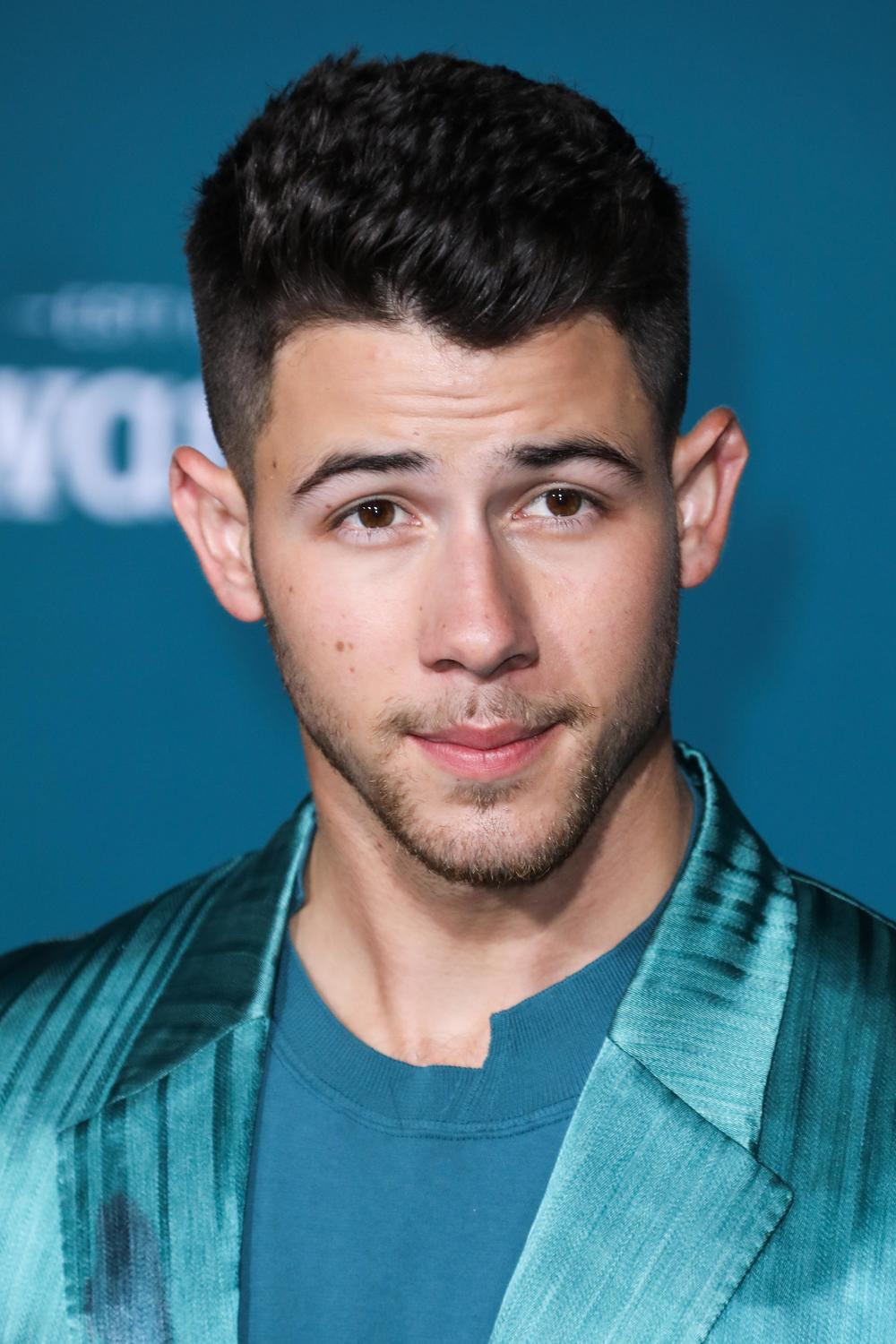 There's Some Sort Of Bulge Going On With Nick Jonas' Silk Pants
