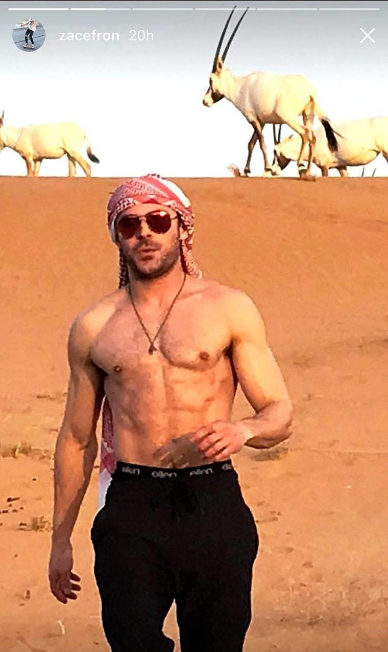 Check Out Zac Efron Riding a Camel With No Shirt