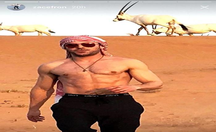 Check Out Zac Efron Riding a Camel With No Shirt