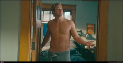 Stephen Kalyn opens door shirtless in Off Campus