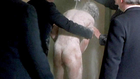 Daniel Day-Lewis Naked as Gerry Conlon. Butt, barefoot, cops. 136437