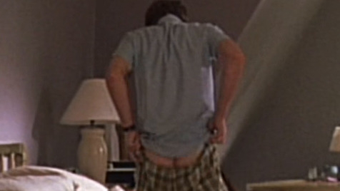 Eddie O'Hare from The Door in the Floor Naked. Butt, nude, pulling up pants. 83999