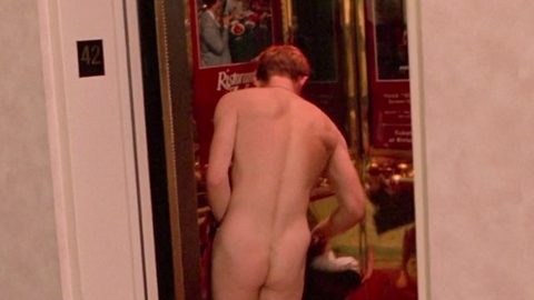 Desmond Askew Nude in Go. Butt, Shirtless, clothes over junk, covering up. 198592