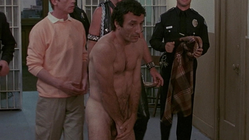 Steven Reisch Naked as Counter Boy. Balls, Shirtless, hand over crotch, jail. 101085