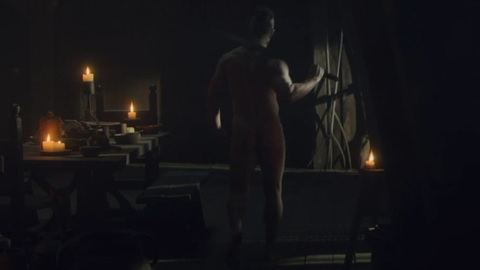 Alexander Dreymon Naked as Uhtred of Bebbanburg. Butt, Shirtless, dimly lit, dining room. 129993