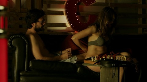 Álvaro Morte in Money Heist (2017-2021) Shirtless Glasses On Couch 77719