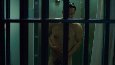 Keanu Reeves Naked in Henry's Crime. Shirtless, Balls, Penis, bars, covering crotch. 84559