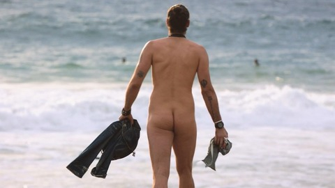 Russell Brand Naked as Lance Klians. Butt, Shirtless, beach, holding clothes. 84633