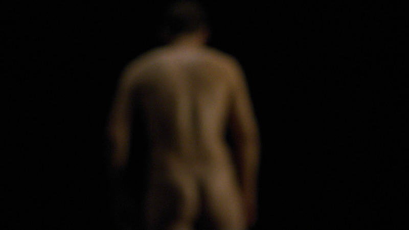 Hugo Becker Naked as Paul Vanhove. Butt, Shirtless, back towards camera, black background. 100851
