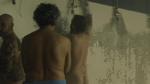 Nudes of Alain Delambre from Inhuman Resources. Butt, Shirtless, against wall, prison shower. 131478