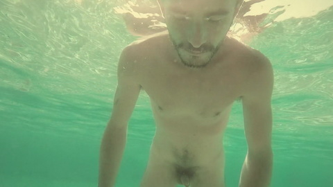 Sanuye Shoteka Nude in He Loves Me. Balls, Penis, Shirtless, floating in water, ocean. 134397