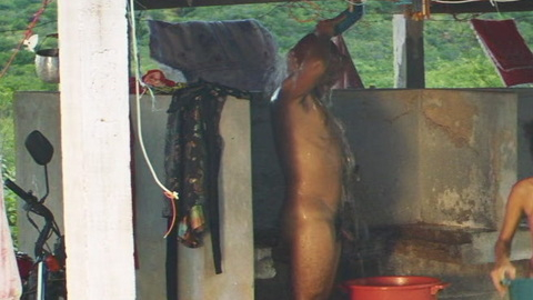 Nudes of Robson from Bacurau. Balls, Penis, Shirtless, background nudity, showering outside. 135882