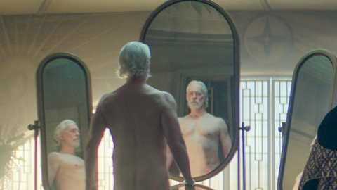 Terrence Mann Nude as Brother Dusk. Butt, Shirtless, beard, grey hair. 198314