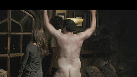 Michael Gladis Naked as T.S. Garp Gault. Butt, Shirtless, arms up, back towards camera. 172341
