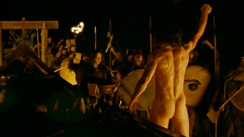 Claes Bang Naked as Fjölnir The Brotherless. Butt, Shirtless, arm up, crowd. 175761