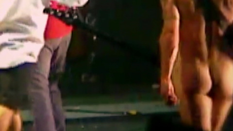 Himself from Trainwreck: Woodstock '99 Naked. Butt, Shirtless, bass guitar, blue hair. 178739