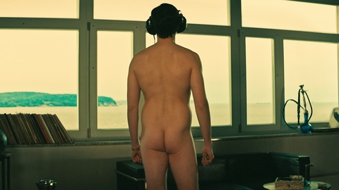 Mateusz Król Nude as Nikodem. Butt, Shirtless, headphone, looking out window. 180974