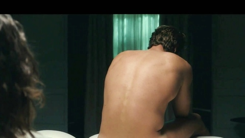 Mario Ermito Naked as Eric Zimmerman. Butt, edge of bed, muscular. 196497