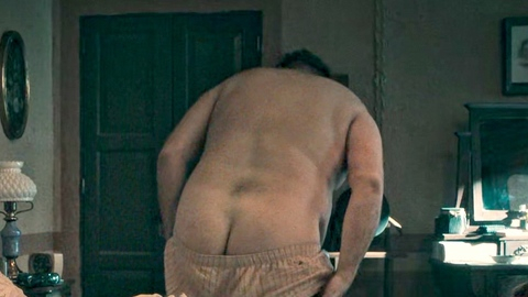 Joaquín Cosío Nude as Captain Bedoya. Butt, Shirtless, boxers pulled down, getting out of bed. 198266