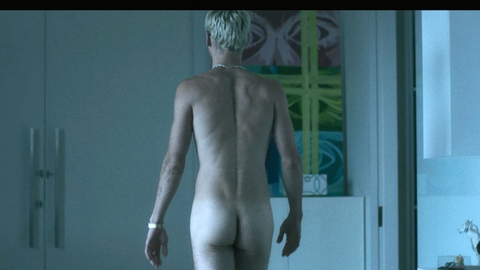 Santiago Achaga Nude as Santos. Butt, bleached blonde hair, getting out of bed. 201122