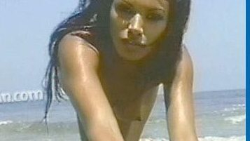 Traci Bingham Naked in Exposed Girls of Baywatch. Breasts, beach, brunette. 535753