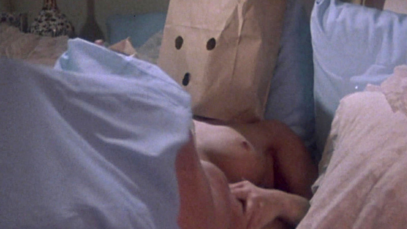 Officer Sue Perman from Night Patrol Naked. Breasts, bag on head, couple. 536105