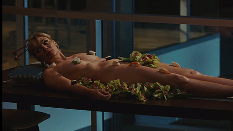 Kim Cattrall in Sex and the City (2008) Sexy Blonde Laying On Table 671245