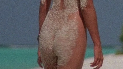 Bo Derek in Ghosts Can't Do It (1989) Breasts Butt Bandana Beach 780992