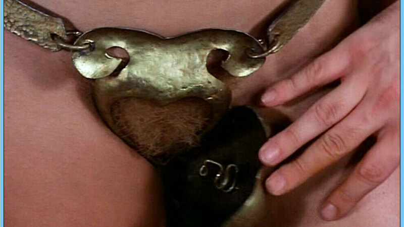 Uschi Digard Nude in Ilsa, Harem Keeper of the Oil Sheiks. Bush, bush close-up, chastity belt. 553936