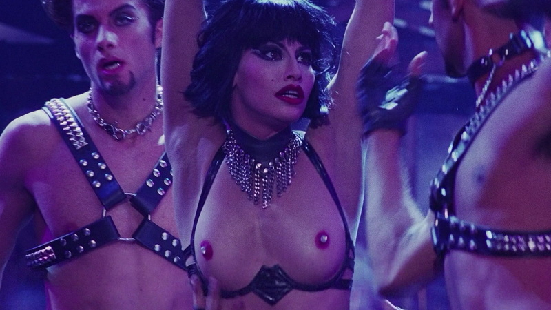 Gina Gershon Naked in Showgirls. Breasts, black hair, jewels on nipples. 685663
