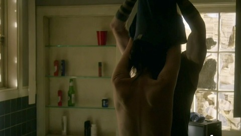 Sexiest Joanna Going Scene in Kingdom. Sexy, back exposed, man taking off woman's shirt. 751417