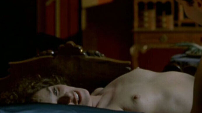 Valeria Golino Nude in Il sole nero. Breasts, brunette, curly hair. 649270