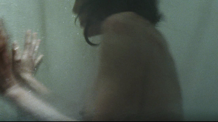 Angelina Jolie Nude as Christine Collins. Breasts, back exposed, bloody hand. 686354
