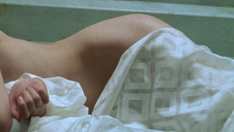 Milla Jovovich in Resident Evil (2002) Sexy Blonde Laying In Shower 690977