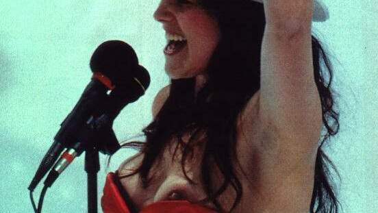 Lucy Lawless Nude as Herself. Breasts, arm raised, breast out of corset. 681554