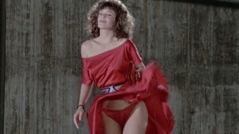 Kelly LeBrock in The Woman in Red (1984) Sexy Underwear Curly Hair Dress Blowing Up 744975