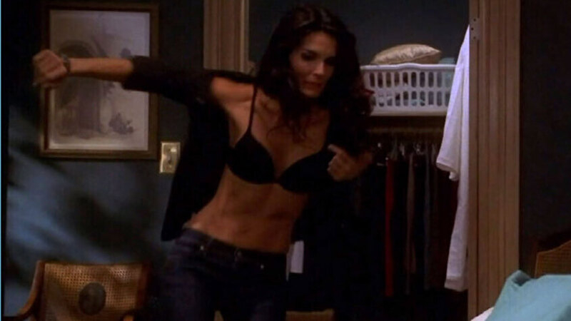 Sexiest Scenes of Lindsay Boxer from Women's Murder Club. Underwear, black bra, putting on shirt. 665321