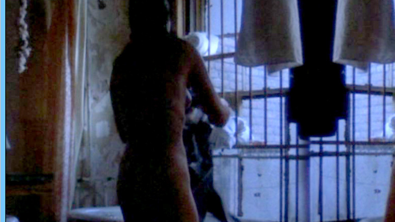 Angela Palumbo from The Gang That Couldn't Shoot Straight Naked. Butt, back exposed, getting dressed. 635201
