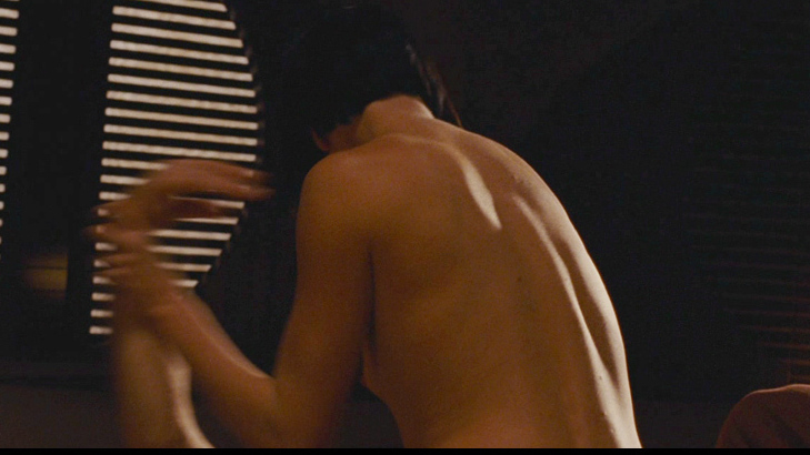 Charlize Theron Naked in Aeon Flux. Breasts, black hair, hard nipple. 684697
