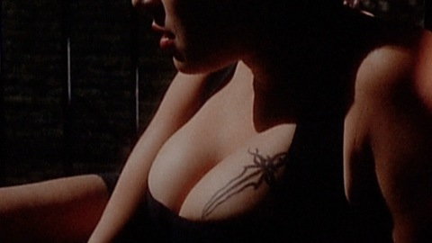 Jennifer Tilly in Embrace of the Vampire (1995) Sexy Black Dress Cleavage 730563
