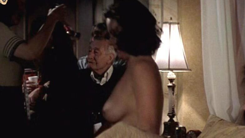 Jennifer Tilly Nude in Hollywood North. Breasts, black hair, couple. 608542