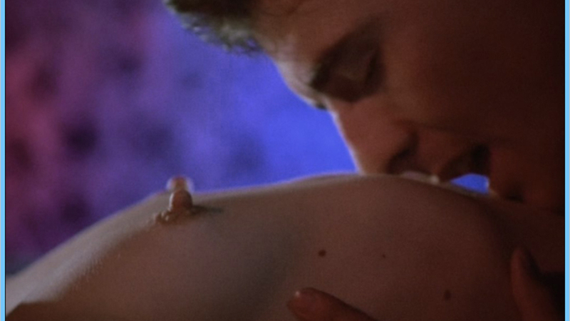 Joanna Crane / China Blue from Crimes of Passion Naked. Breasts, hard nipples, kissing stomach. 554195