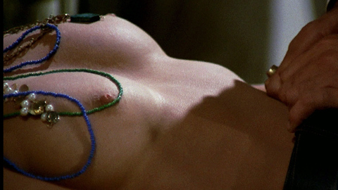 Elke Sommer in The House of Exorcism (1975) Breasts Bead Necklace Breast Close Up 718650