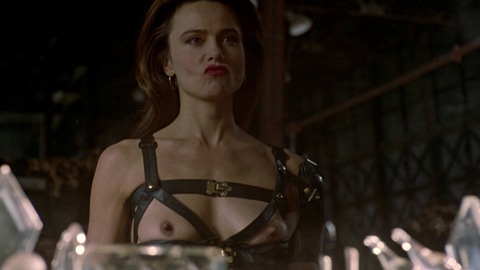 Mona Demarkov from Romeo Is Bleeding Naked. Breasts, Underwear, dark hair, leather strap outfit. 774377