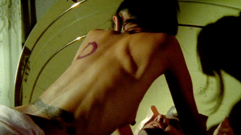 Bai Ling Nude as Nok. Breasts, back exposed, bed. 711878