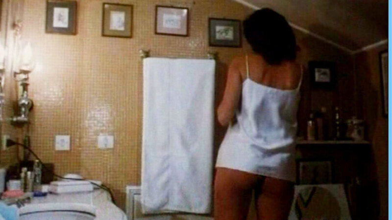 Serena Grandi Naked in La signora della notte. Butt, black hair, bottomless. 565771