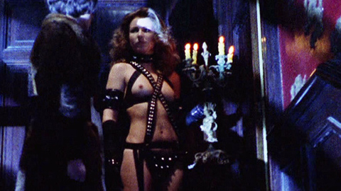 Ely Galleani in Baba Yaga (1973) Breasts Black Belt Black Leggings 706740