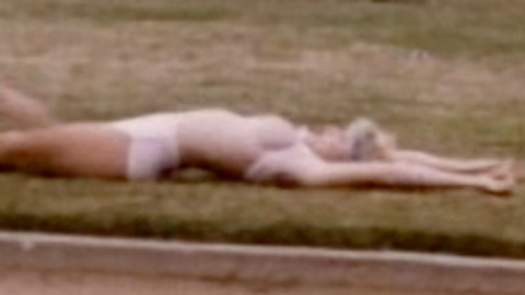 Lynda Wiesmeier Naked in Imps*. Breasts, blonde, laying in grass. 711979