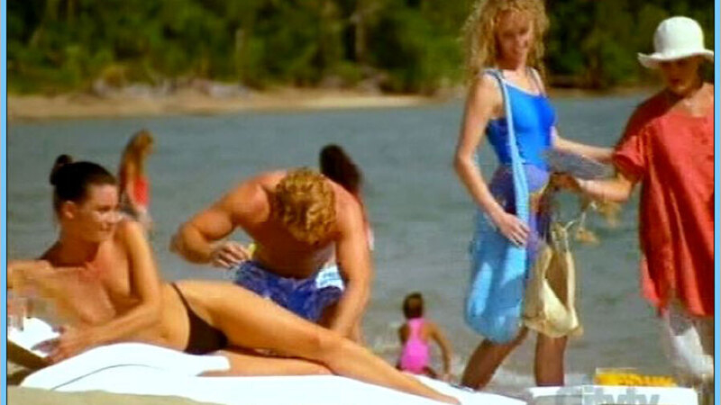 Lucille Fournier from Tribe Naked. Breasts, beach, black bikini. 669749