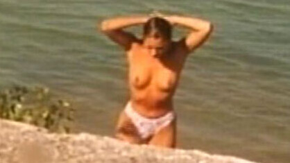 Cristiana Réali Naked in Le raisin d'or. Breasts, black hair, in mirror. 572161
